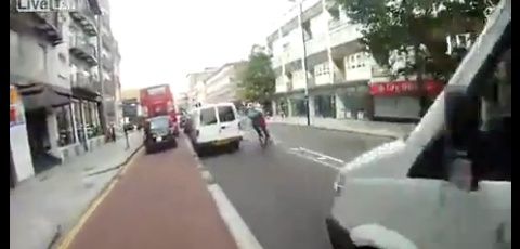 Biker Gets Squashed Trying To Cut Traffic